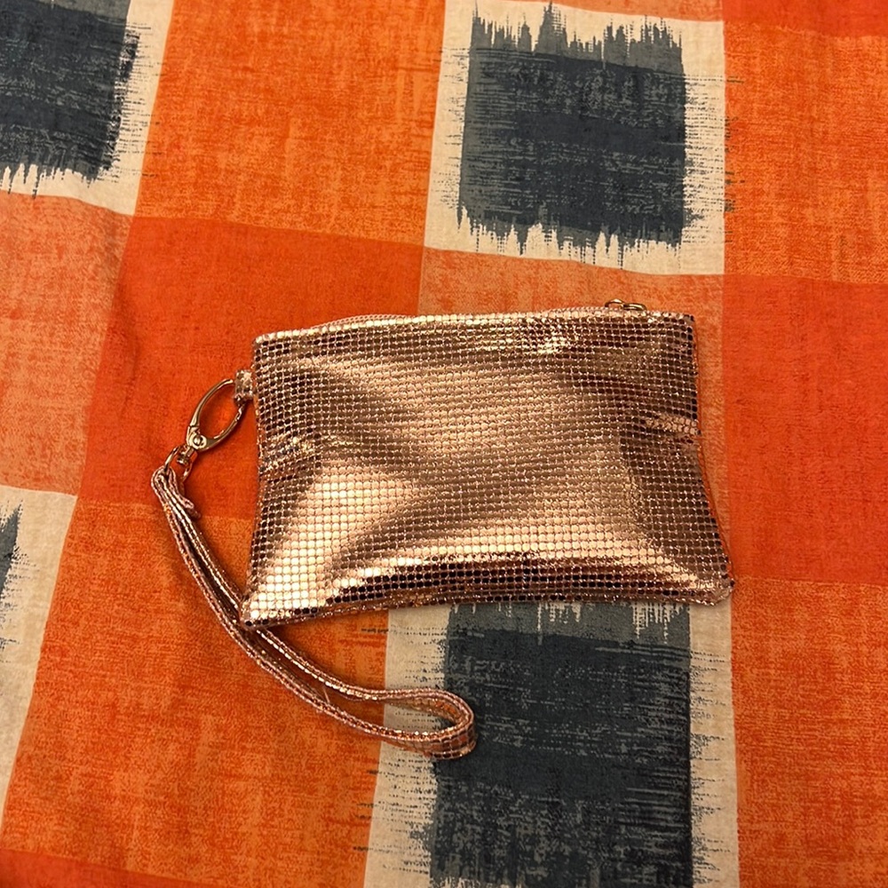 Rose gold mini purse.